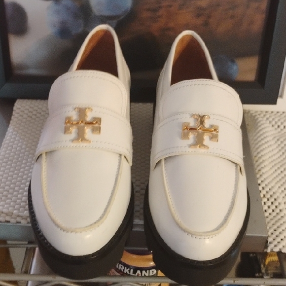 Tory Burch Shoes - Tory Burch White Loafers with Gold Emblem never worn